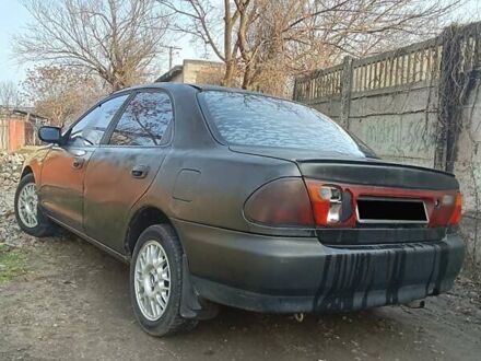 Серый Мазда 323, объемом двигателя 1.5 л и пробегом 500 тыс. км за 2000 $, фото 1 на Automoto.ua