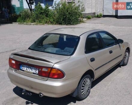 Сірий Мазда 323, об'ємом двигуна 1.5 л та пробігом 390 тис. км за 2500 $, фото 1 на Automoto.ua