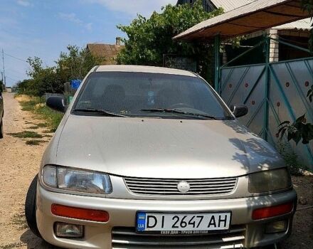 Сірий Мазда 323, об'ємом двигуна 1.5 л та пробігом 52 тис. км за 1000 $, фото 1 на Automoto.ua