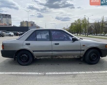 Серый Мазда 323, объемом двигателя 1.6 л и пробегом 327 тыс. км за 900 $, фото 1 на Automoto.ua