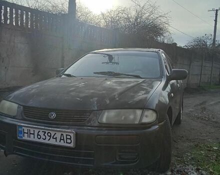 Сірий Мазда 323, об'ємом двигуна 1.5 л та пробігом 700 тис. км за 900 $, фото 1 на Automoto.ua