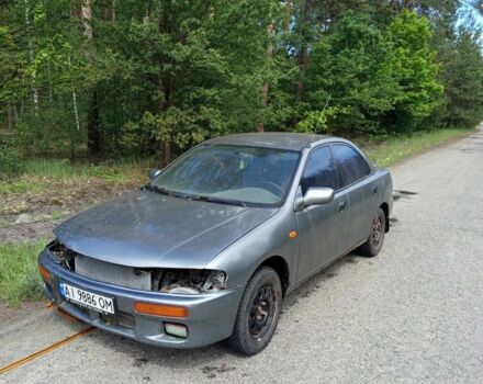 Серый Мазда 323, объемом двигателя 1.5 л и пробегом 196 тыс. км за 500 $, фото 1 на Automoto.ua