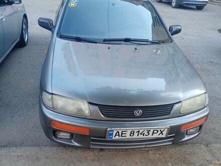 Сірий Мазда 323, об'ємом двигуна 1.49 л та пробігом 300 тис. км за 2600 $, фото 1 на Automoto.ua