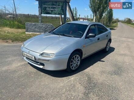 Серый Мазда 323, объемом двигателя 1.5 л и пробегом 230 тыс. км за 1850 $, фото 1 на Automoto.ua