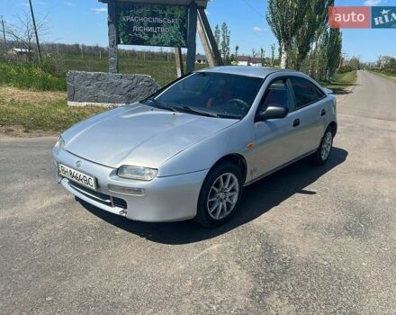 Серый Мазда 323, объемом двигателя 1.5 л и пробегом 230 тыс. км за 1850 $, фото 1 на Automoto.ua