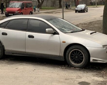 Сірий Мазда 323, об'ємом двигуна 1.5 л та пробігом 350 тис. км за 1200 $, фото 1 на Automoto.ua