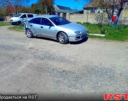 Серый Мазда 323, объемом двигателя 1.5 л и пробегом 230 тыс. км за 1600 $, фото 1 на Automoto.ua