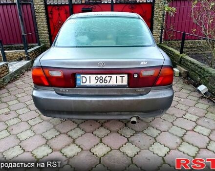 Серый Мазда 323, объемом двигателя 1.5 л и пробегом 0 тыс. км за 600 $, фото 1 на Automoto.ua