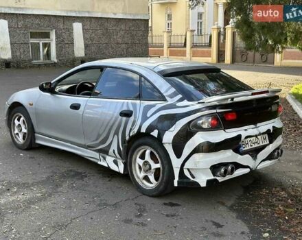 Серый Мазда 323, объемом двигателя 1.49 л и пробегом 300 тыс. км за 1700 $, фото 1 на Automoto.ua