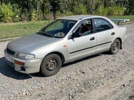Сірий Мазда 323, об'ємом двигуна 1.6 л та пробігом 150 тис. км за 1447 $, фото 1 на Automoto.ua