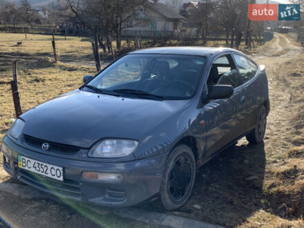 Серый Мазда 323, объемом двигателя 1.5 л и пробегом 218 тыс. км за 2300 $, фото 1 на Automoto.ua