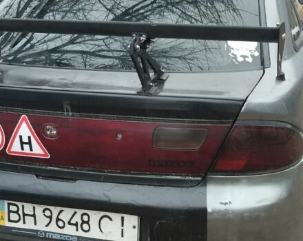 Серый Мазда 323, объемом двигателя 0 л и пробегом 400 тыс. км за 1200 $, фото 1 на Automoto.ua