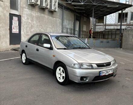 Сірий Мазда 323, об'ємом двигуна 1.5 л та пробігом 220 тис. км за 1505 $, фото 1 на Automoto.ua