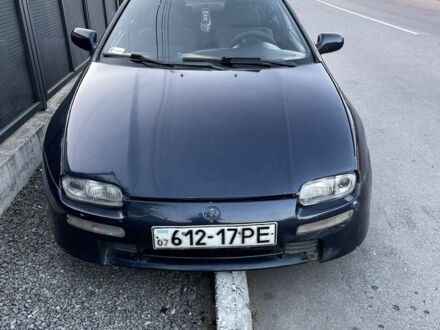 Мазда 323 1997 у Хусте на Automoto.ua Сірий Мазда 323, об'ємом двигуна 1.5 л та пробігом 1 тис. км за 1100 $, фото 1 на Automoto.ua
