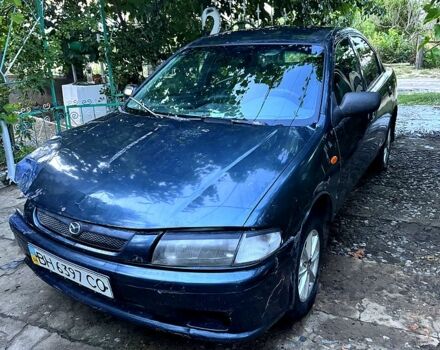 Сірий Мазда 323, об'ємом двигуна 1.5 л та пробігом 0 тис. км за 1100 $, фото 1 на Automoto.ua