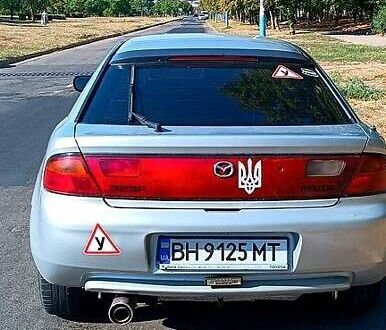 Сірий Мазда 323, об'ємом двигуна 1.4 л та пробігом 360 тис. км за 2500 $, фото 1 на Automoto.ua