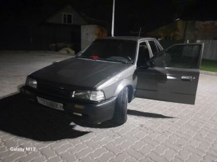 Сірий Мазда 323, об'ємом двигуна 0 л та пробігом 200 тис. км за 900 $, фото 1 на Automoto.ua