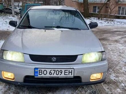 Сірий Мазда 323, об'ємом двигуна 1.49 л та пробігом 250 тис. км за 1900 $, фото 1 на Automoto.ua
