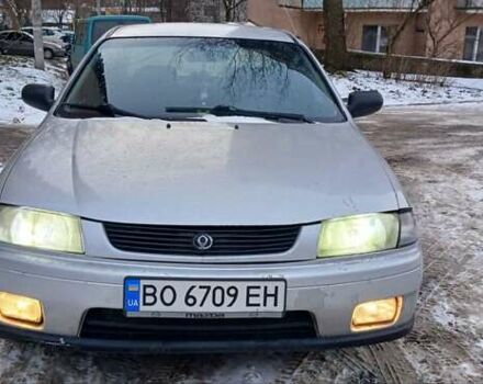 Серый Мазда 323, объемом двигателя 1.49 л и пробегом 250 тыс. км за 1850 $, фото 1 на Automoto.ua