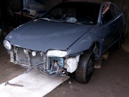 Серый Мазда 323, объемом двигателя 0 л и пробегом 35 тыс. км за 1600 $, фото 1 на Automoto.ua