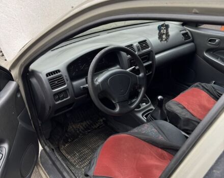 Серый Мазда 323, объемом двигателя 1.5 л и пробегом 3 тыс. км за 2000 $, фото 1 на Automoto.ua