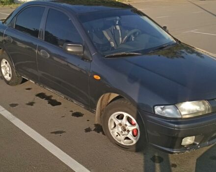 Сірий Мазда 323, об'ємом двигуна 1.5 л та пробігом 450 тис. км за 3200 $, фото 1 на Automoto.ua