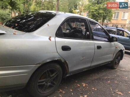 Мазда 323 1998 у Києві на Automoto.ua Сірий Мазда 323, об'ємом двигуна 1.5 л та пробігом 320 тис. км за 1200 $, фото 1 на Automoto.ua
