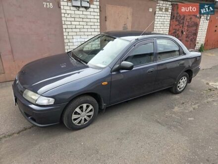 Сірий Мазда 323, об'ємом двигуна 1.5 л та пробігом 320 тис. км за 3100 $, фото 1 на Automoto.ua