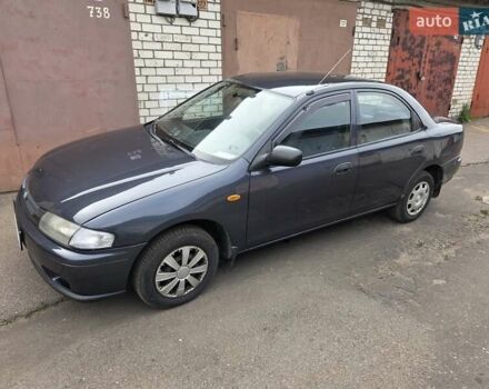 Сірий Мазда 323, об'ємом двигуна 1.5 л та пробігом 320 тис. км за 3100 $, фото 1 на Automoto.ua
