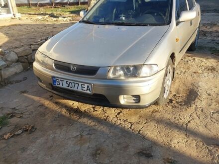 Сірий Мазда 323, об'ємом двигуна 1.5 л та пробігом 400 тис. км за 2383 $, фото 1 на Automoto.ua