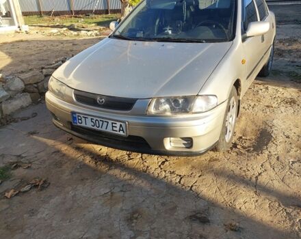 Сірий Мазда 323, об'ємом двигуна 1.5 л та пробігом 400 тис. км за 2383 $, фото 1 на Automoto.ua