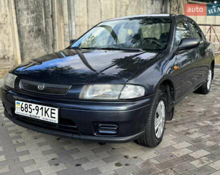 Серый Мазда 323, объемом двигателя 0 л и пробегом 260 тыс. км за 2800 $, фото 1 на Automoto.ua