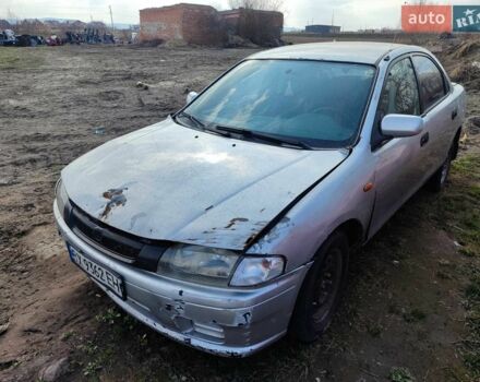 Серый Мазда 323, объемом двигателя 1.5 л и пробегом 250 тыс. км за 900 $, фото 1 на Automoto.ua