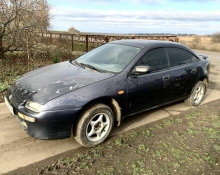 Сірий Мазда 323, об'ємом двигуна 1.5 л та пробігом 300 тис. км за 1200 $, фото 1 на Automoto.ua