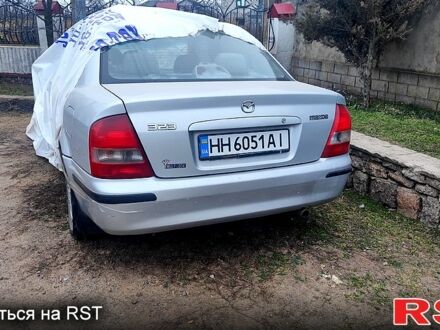 Сірий Мазда 323, об'ємом двигуна 1.8 л та пробігом 217 тис. км за 900 $, фото 1 на Automoto.ua