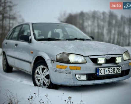 Сірий Мазда 323, об'ємом двигуна 2 л та пробігом 389 тис. км за 725 $, фото 1 на Automoto.ua