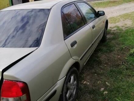 Серый Мазда 323, объемом двигателя 1.8 л и пробегом 900 тыс. км за 1200 $, фото 1 на Automoto.ua