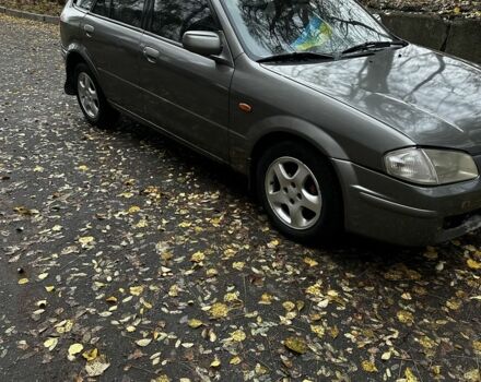 Серый Мазда 323, объемом двигателя 1.5 л и пробегом 315 тыс. км за 1300 $, фото 1 на Automoto.ua