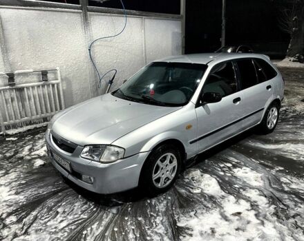 Серый Мазда 323, объемом двигателя 1.5 л и пробегом 400 тыс. км за 1950 $, фото 1 на Automoto.ua