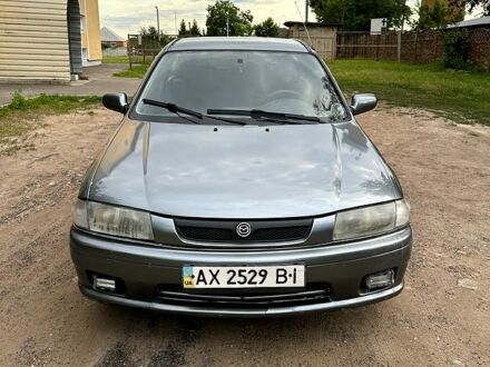 Сірий Мазда 323, об'ємом двигуна 1.3 л та пробігом 320 тис. км за 1650 $, фото 1 на Automoto.ua