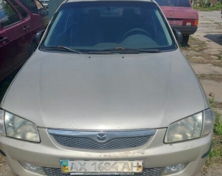 Серый Мазда 323, объемом двигателя 1.8 л и пробегом 222 тыс. км за 400 $, фото 1 на Automoto.ua