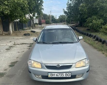 Сірий Мазда 323, об'ємом двигуна 1.5 л та пробігом 330 тис. км за 2004 $, фото 1 на Automoto.ua