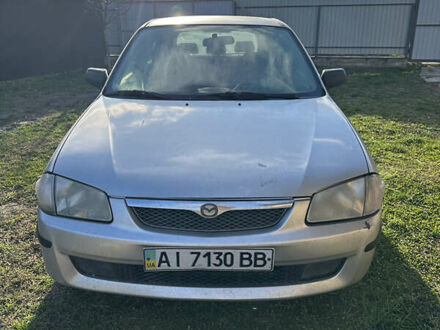 Серый Мазда 323, объемом двигателя 1.5 л и пробегом 230 тыс. км за 2400 $, фото 1 на Automoto.ua