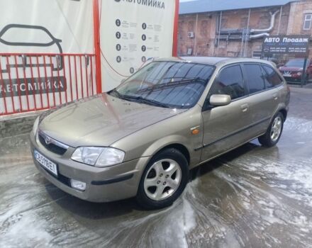 Серый Мазда 323, объемом двигателя 1.8 л и пробегом 300 тыс. км за 3000 $, фото 1 на Automoto.ua