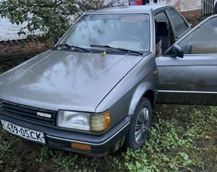 Сірий Мазда 323, об'ємом двигуна 0 л та пробігом 2 тис. км за 958 $, фото 1 на Automoto.ua