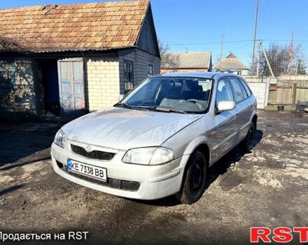 Серый Мазда 323, объемом двигателя 2 л и пробегом 284 тыс. км за 1500 $, фото 1 на Automoto.ua