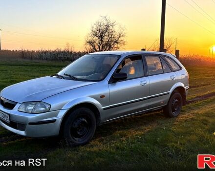 Серый Мазда 323, объемом двигателя 2 л и пробегом 250 тыс. км за 1700 $, фото 1 на Automoto.ua
