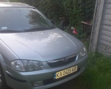 Серый Мазда 323, объемом двигателя 1.5 л и пробегом 150 тыс. км за 1300 $, фото 1 на Automoto.ua