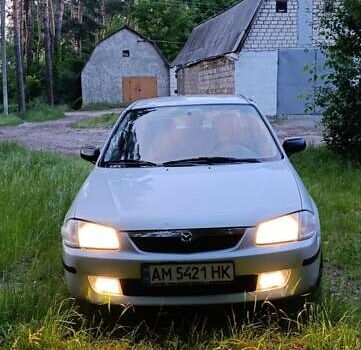 Сірий Мазда 323, об'ємом двигуна 1.5 л та пробігом 150 тис. км за 3200 $, фото 1 на Automoto.ua