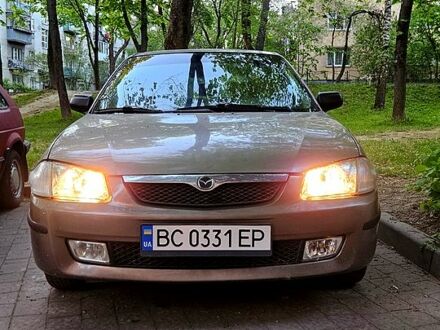 Серый Мазда 323, объемом двигателя 1.5 л и пробегом 331 тыс. км за 2300 $, фото 1 на Automoto.ua